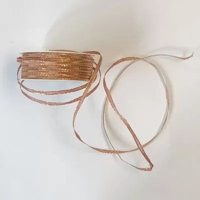 Nastro mm.05 m.30 taff.lurex rosa ant.