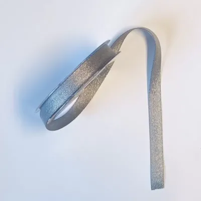 Nastro spark oro mm.15 mt.20 carta zucch.